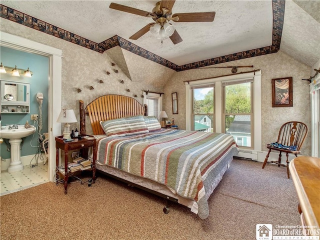 10412 Main St, Mina, NY 14736 - carpeted bedroom with vaulted ceiling, a textured ceiling, ensuite bathroom, ceiling fan, and baseboards
