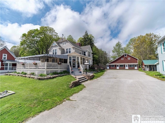 10412 Main St, Mina, NY 14736 - view of front of house with a front lawn and a deck