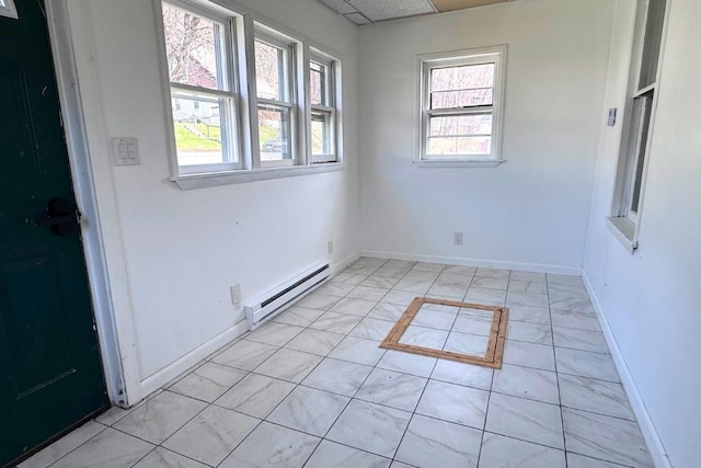 5 Bronk St, Oneonta-City, NY 13820 - unfurnished room featuring a baseboard radiator, healthy amount of natural light, baseboards, and light marble finish floors