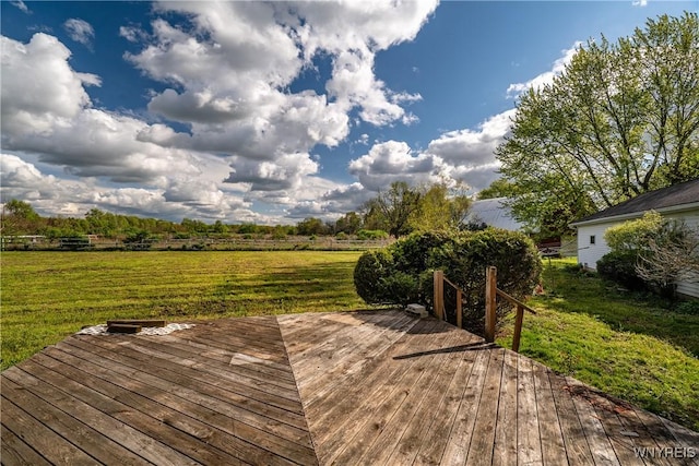 wooden deck with a yard