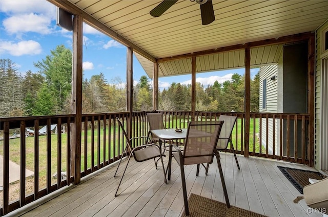 463 Hughes Rd, Russia, NY 13438 - sunroom with ceiling fan, outdoor dining space, and view of scattered trees