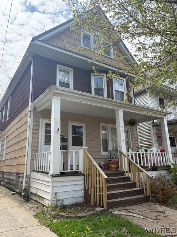 11 Indian Church Rd Unit S, Buffalo, NY 14210 - view of front of home with a porch
