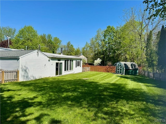 6 Tyler Ct, Manlius, NY 13104 - view of yard featuring a storage unit and an outdoor structure