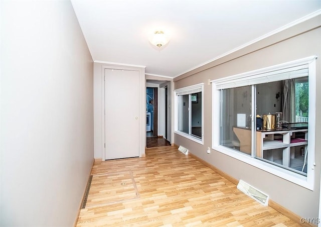 6 Tyler Ct, Manlius, NY 13104 - spare room with light wood-style flooring, baseboards, and ornamental molding