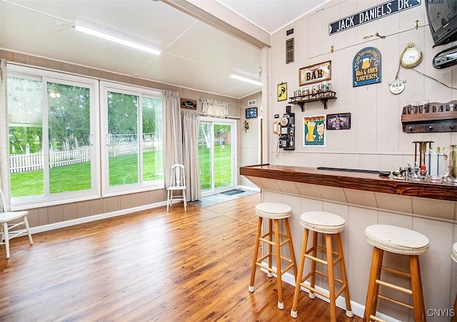 6 Tyler Ct, Manlius, NY 13104 - indoor dry bar with wood finished floors and crown molding