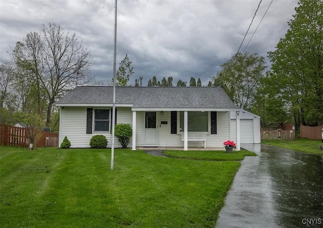 6 Tyler Ct, Manlius, NY 13104 - view of front of house with driveway, covered porch, an attached garage, and a shingled roof