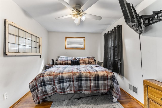 2033 Clarkson Parma Tl Rd, Clarkson, NY 14420 - bedroom featuring wood finished floors, a ceiling fan, and baseboards