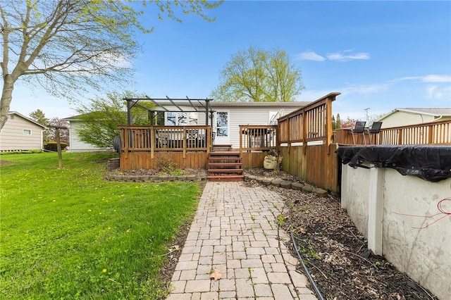 2033 Clarkson Parma Tl Rd, Clarkson, NY 14420 - back of house with a wooden deck and a yard
