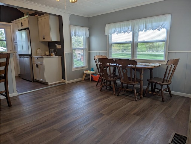 5 S Hartland St, Royalton, NY 14105 - dining space with a wainscoted wall, plenty of natural light, crown molding, and dark wood-style flooring
