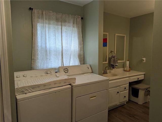 5 S Hartland St, Royalton, NY 14105 - clothes washing area with washing machine and dryer, dark wood-style flooring, and cabinet space