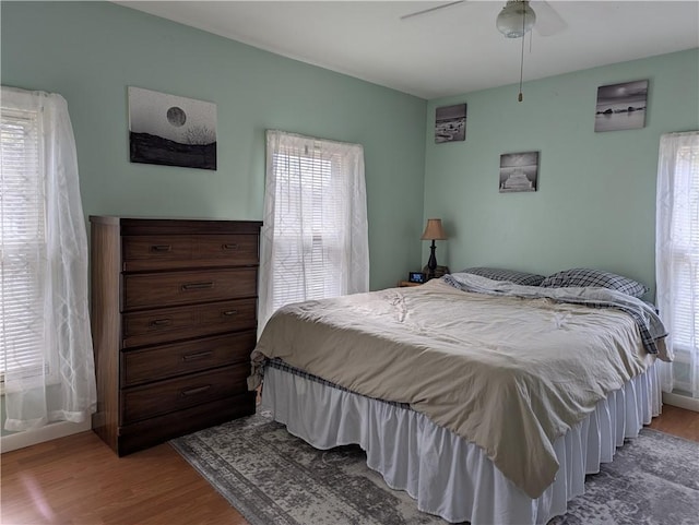 5 S Hartland St, Royalton, NY 14105 - bedroom with wood finished floors, multiple windows, and ceiling fan