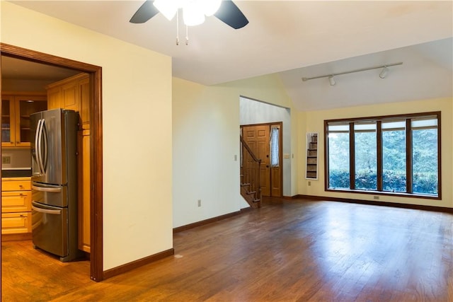 48 Hemlock Ln, Erwin, NY 14870 - unfurnished living room featuring a ceiling fan, dark wood-style floors, stairway, rail lighting, and lofted ceiling