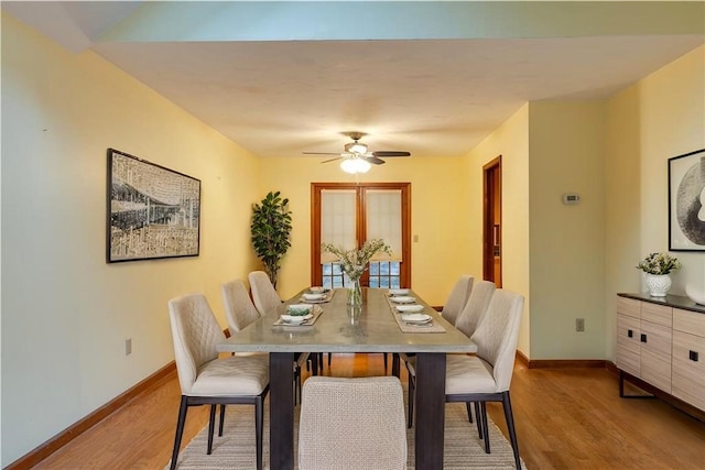 48 Hemlock Ln, Erwin, NY 14870 - dining room featuring wood finished floors and ceiling fan