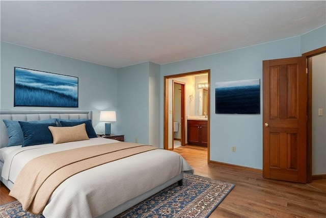 48 Hemlock Ln, Erwin, NY 14870 - bedroom with wood finished floors and ensuite bath
