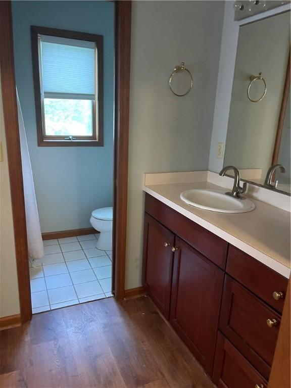 48 Hemlock Ln, Erwin, NY 14870 - bathroom with vanity and wood finished floors