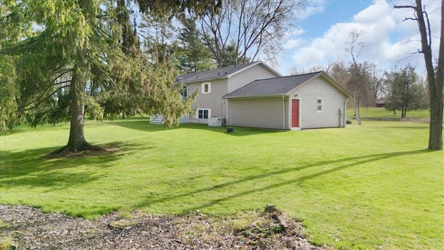 view of property exterior featuring a yard