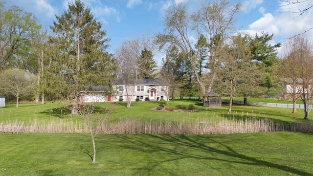 view of grassy yard with a gazebo
