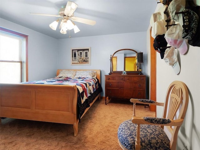 bedroom featuring carpet and ceiling fan