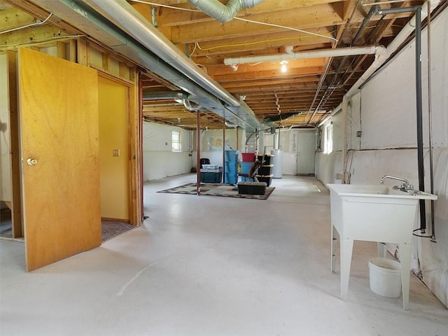 basement featuring gas water heater