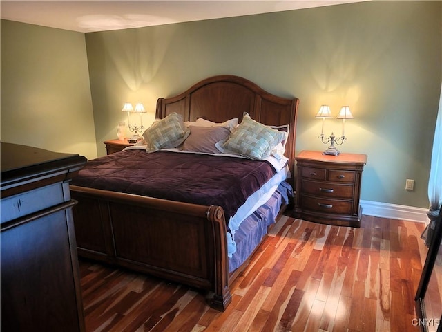 3130 Meadow View Ln, Sennett, NY 13021 - bedroom with dark wood-style floors and baseboards