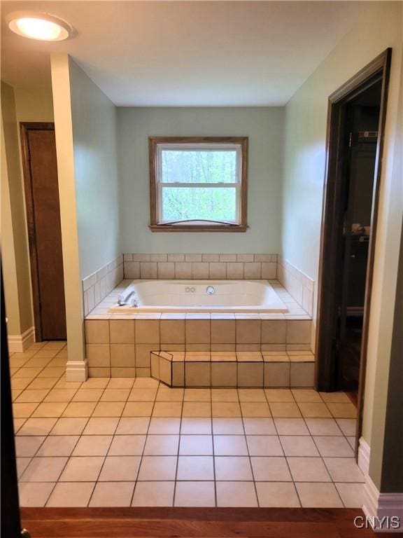 3130 Meadow View Ln, Sennett, NY 13021 - bathroom with tile patterned flooring and a bath