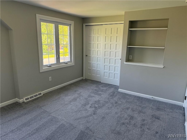 196 Montbleu Dr, Amherst, NY 14068 - unfurnished bedroom with carpet floors, baseboards, and a closet