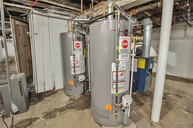 utility room featuring gas water heater