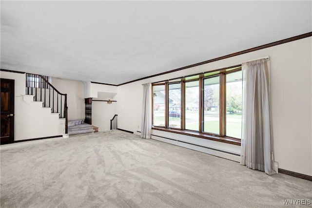 187 Dan Troy Dr, Amherst, NY 14221 - unfurnished living room featuring a baseboard radiator, crown molding, carpet flooring, baseboards, and stairway