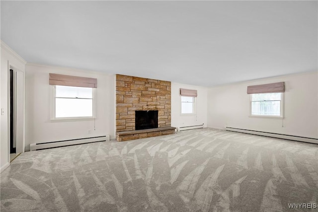 187 Dan Troy Dr, Amherst, NY 14221 - unfurnished living room with a baseboard heating unit, baseboard heating, plenty of natural light, and crown molding