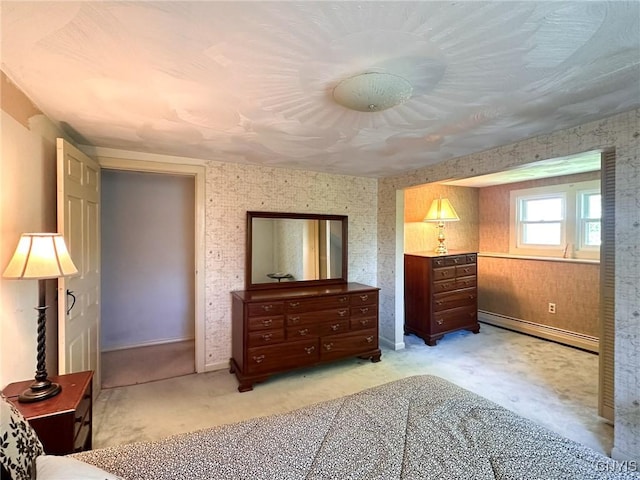 1401 Utica St, Whitestown, NY 13424 - bedroom with baseboard heating, light colored carpet, and baseboards