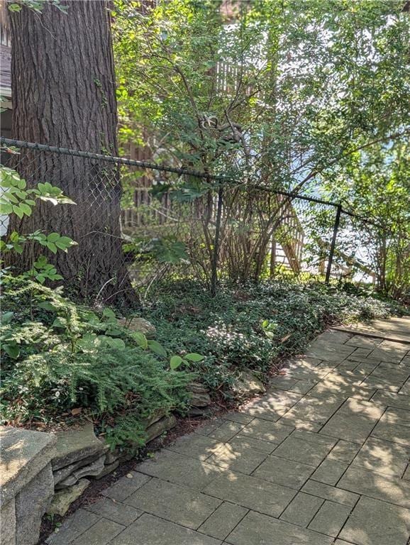 9107 E Shore Rd, Howard, NY 14810 - view of patio featuring fence