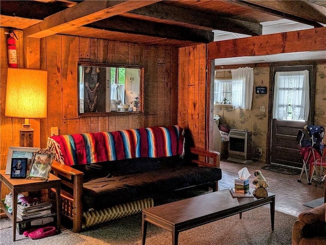 9107 E Shore Rd, Howard, NY 14810 - living room with beam ceiling, wood walls, and heating unit