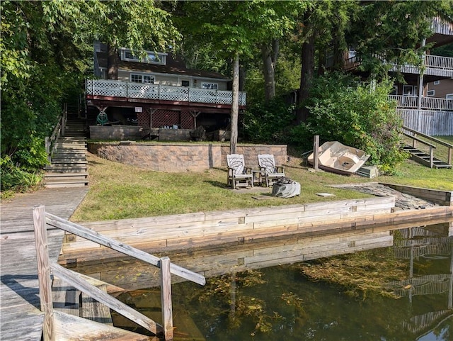 9107 E Shore Rd, Howard, NY 14810 - dock area with stairway, a deck with water view, and a lawn