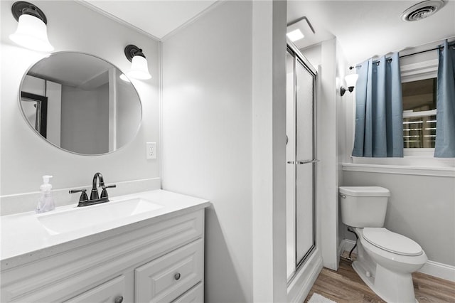 35 Squire Cir, Penfield, NY 14526 - full bath with wood finished floors, a stall shower, toilet, and vanity