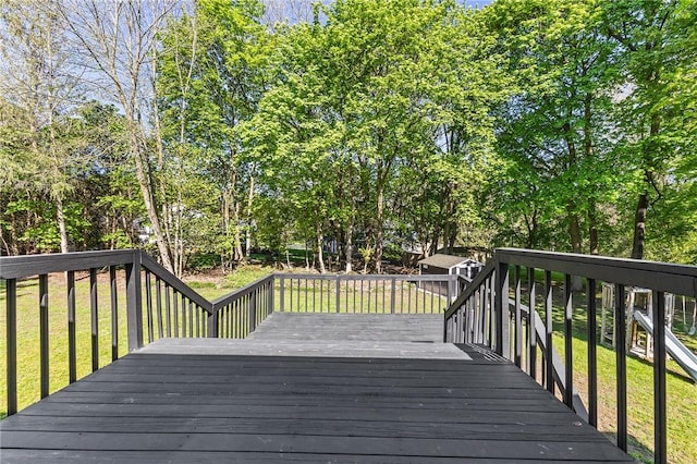 35 Squire Cir, Penfield, NY 14526 - wooden terrace with a yard, a storage shed, and an outbuilding