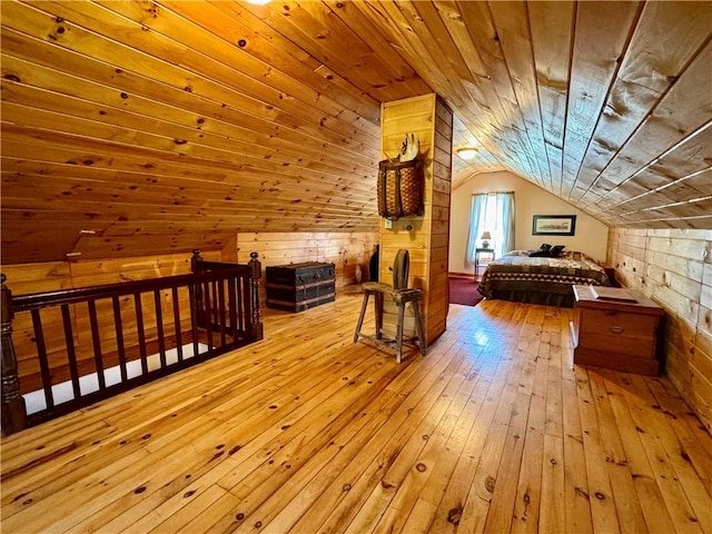 225 John Cook Rd, Unadilla, NY 13849 - bedroom with lofted ceiling, wood-type flooring, wooden walls, and wood ceiling