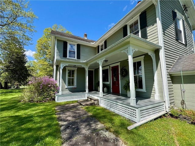 225 John Cook Rd, Unadilla, NY 13849 - view of front of property featuring covered porch and a front lawn