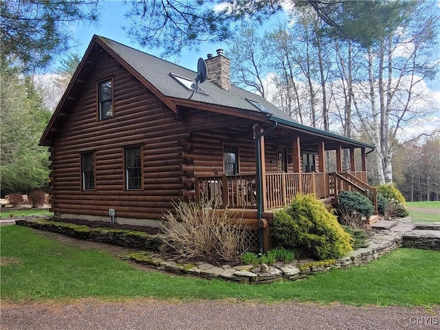 177 Woodchuck Run, Jefferson, NY 12093 - view of property exterior with a porch, a chimney, and log siding