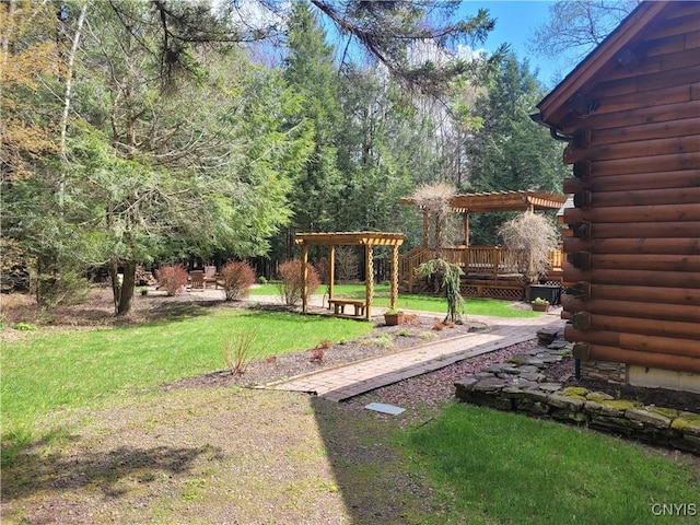 177 Woodchuck Run, Jefferson, NY 12093 - view of green lawn with a pergola and a deck