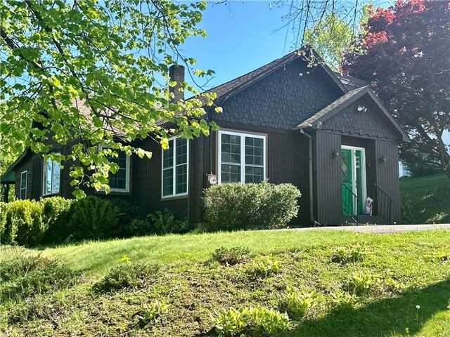 5 Orchard Dr, Corning, NY 14830 - view of front of property featuring a chimney and a front yard