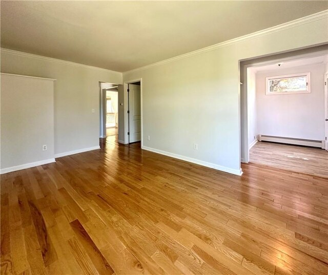 5 Orchard Dr, Corning, NY 14830 - unfurnished room featuring a baseboard radiator, wood finished floors, ornamental molding, and baseboards