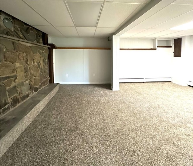 5 Orchard Dr, Corning, NY 14830 - finished below grade area with a paneled ceiling, baseboard heating, and carpet floors