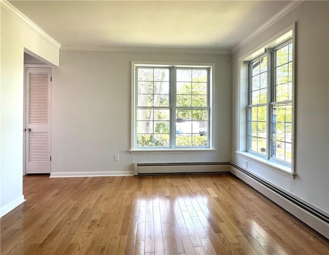 5 Orchard Dr, Corning, NY 14830 - empty room with baseboard heating, wood-type flooring, ornamental molding, and baseboards