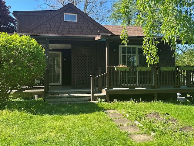 5 Orchard Dr, Corning, NY 14830 - back of property featuring a yard and a shingled roof