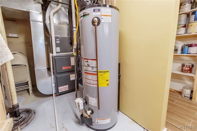 233 Falls Rd, Aurora, NY 14170 - utility room featuring gas water heater and heating unit