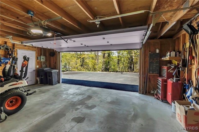233 Falls Rd, Aurora, NY 14170 - garage with a garage door opener