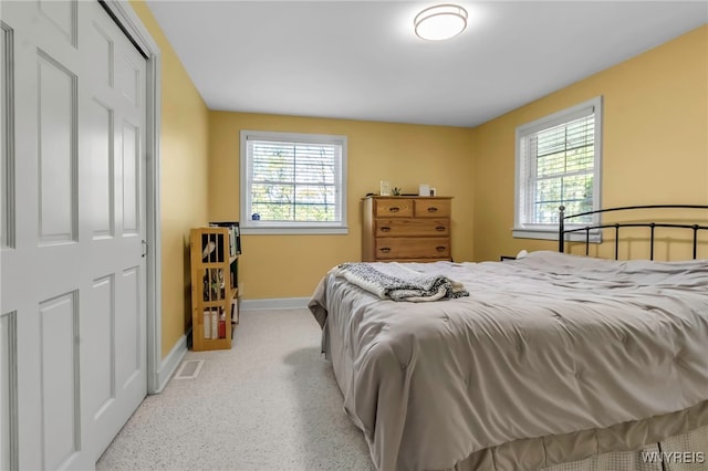 233 Falls Rd, Aurora, NY 14170 - bedroom with multiple windows and baseboards