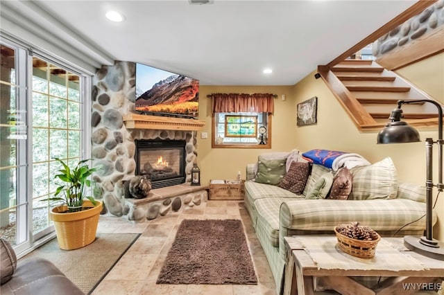 233 Falls Rd, Aurora, NY 14170 - living room featuring a fireplace and recessed lighting