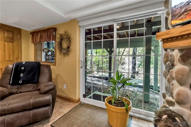 233 Falls Rd, Aurora, NY 14170 - doorway with tile patterned flooring and baseboards