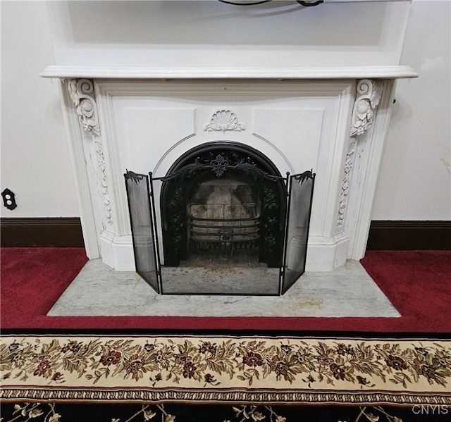 24 Grover St, Auburn, NY 13021 - detailed view of carpet and baseboards